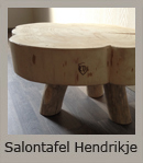 Salontafel gemaakt van een schijf conifeer